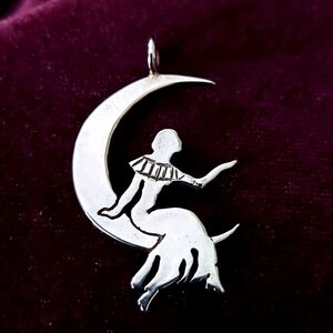 Pendant of Lady sitting on the Moon